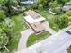 Aerial view of property with winding brick driveway and lush green lawn at 740 Florida Blvd, Altamonte Springs, FL 32701