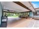 Carport has an outdoor cooking area with outdoor seating at 740 Florida Blvd, Altamonte Springs, FL 32701