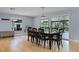 Well-lit dining room with natural light, a dark table and views of the backyard patio at 740 Florida Blvd, Altamonte Springs, FL 32701