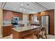 Well-equipped kitchen with stainless steel appliances, granite countertops, and custom cabinetry at 740 Florida Blvd, Altamonte Springs, FL 32701
