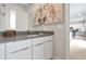 Bathroom with white cabinetry, gray countertops, and modern fixtures at 7740 Sandy Ridge Dr # 114, Reunion, FL 34747