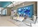 Welcoming lobby area with modern decor, comfortable seating, and stylish wall art at 7740 Sandy Ridge Dr # 114, Reunion, FL 34747