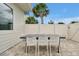 A patio provides a peaceful outdoor dining experience with a large table and ample seating at 7740 Sandy Ridge Dr # 114, Reunion, FL 34747