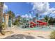 Fun waterpark featuring slides, splash pads, and play structures for and families to enjoy at 7740 Sandy Ridge Dr # 114, Reunion, FL 34747