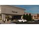 Contemporary commercial building featuring dedicated signage, welcoming outdoor seating, and convenient parking at 7900 S Orange Blossom Trl # 2108, Orlando, FL 32809