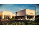 Commercial building exterior showing signage spaces, covered area, and inviting storefronts with ample parking at 7900 S Orange Blossom Trl # 2108, Orlando, FL 32809