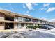 Motel exterior featuring an outdoor balcony and ample parking at 7900 S Orange Blossom Trl # 2108, Orlando, FL 32809