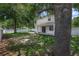 Spacious grassy backyard and covered patio area of home at 809 Kazaros Cir, Ocoee, FL 34761