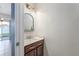 Powder room with under sink storage and vanity lighting at 809 Kazaros Cir, Ocoee, FL 34761