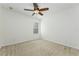 Bedroom with neutral carpet, ceiling fan, and one window at 809 Kazaros Cir, Ocoee, FL 34761