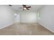 Bright bedroom with neutral carpet, ceiling fan, and a window at 809 Kazaros Cir, Ocoee, FL 34761