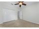 Bedroom with carpet, ceiling fan and double closet at 809 Kazaros Cir, Ocoee, FL 34761