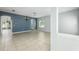 Inviting living area with neutral colors, tile flooring, and ample natural light at 809 Kazaros Cir, Ocoee, FL 34761
