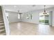 Bright living room with tile flooring, and view of the backyard at 809 Kazaros Cir, Ocoee, FL 34761