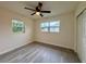 Cozy bedroom features ample natural light and neutral colored walls at 8320 Dominguin St, Orlando, FL 32817