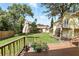 Backyard view from the deck featuring a grass yard at 835 Antonette Ave, Winter Park, FL 32789