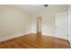 Spacious bedroom with hardwood floors and large doorway at 835 Antonette Ave, Winter Park, FL 32789