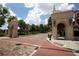 Elegant entrance to Rollins College with brick-paved road and manicured landscaping at 835 Antonette Ave, Winter Park, FL 32789