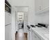 Galley kitchen leading to a bathroom at 835 Antonette Ave, Winter Park, FL 32789