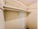 Bright closet with shelving and rack, ready for organizing clothes and storage at 8404 Singapore Ct, Orlando, FL 32817