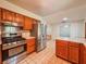 Bright kitchen features stainless steel appliances and plenty of cabinet space at 8404 Singapore Ct, Orlando, FL 32817