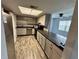 Modern kitchen featuring updated appliances and generous counter space at 9918 Turf Way # 5, Orlando, FL 32837