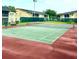 Outdoor tennis courts and common area create recreational activities and community engagement at 9918 Turf Way # 5, Orlando, FL 32837