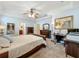 The spacious bedroom features a desk area, providing a dedicated space for work or study at 12641 Arley Dr, Windermere, FL 34786