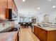Well-equipped kitchen with an open layout to the dining and living areas, perfect for entertaining at 12641 Arley Dr, Windermere, FL 34786