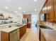 Modern kitchen with stainless steel appliances, granite countertops, and ample cabinet space at 12641 Arley Dr, Windermere, FL 34786