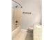 Cozy bathroom features a tiled shower/tub combination and a vanity with granite countertop at 10513 Leader Ln, Orlando, FL 32825
