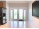 Bright kitchen featuring stainless steel appliances and light wood cabinetry at 10513 Leader Ln, Orlando, FL 32825