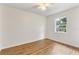 Empty bedroom with wood laminate flooring and natural light at 108 Devon Ct, Longwood, FL 32779