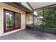 Screened patio with a view of the backyard at 108 Devon Ct, Longwood, FL 32779