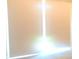 Window with white blinds allowing natural light into the room at 10969 Norcross Cir, Orlando, FL 32825