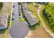 Aerial view of property showcasing complex, parking, and surroundings at 110 Claire Ln, Davenport, FL 33837