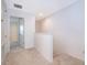 Upstairs hallway with carpet flooring and views into the bedrooms at 110 Claire Ln, Davenport, FL 33837