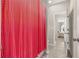 Bathroom featuring a shower with a red curtain and tile flooring at 1113 Fieldstone Cir, Oviedo, FL 32765