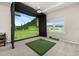 Bonus room with golf simulator, projector, and simulated golf course to enjoy playing the game at 1113 Fieldstone Cir, Oviedo, FL 32765