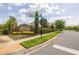 Welcoming community entrance with brick signage, mature landscaping, and gated access for added security at 1113 Fieldstone Cir, Oviedo, FL 32765