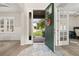 Inviting foyer with wood floors and view to the front yard at 1113 Fieldstone Cir, Oviedo, FL 32765