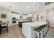 Bright eat-in kitchen with an island, stainless appliances, and modern cabinetry at 1113 Fieldstone Cir, Oviedo, FL 32765