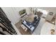 Airy living room boasting natural light, wood floors, board and batten feature wall and a comfortable sectional sofa at 1113 Fieldstone Cir, Oviedo, FL 32765
