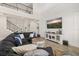 Spacious living room features a large sectional sofa and an entertainment center at 1113 Fieldstone Cir, Oviedo, FL 32765