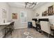 Home office features wood floors and dual workstations, ideal for productivity at 1113 Fieldstone Cir, Oviedo, FL 32765