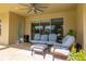 Cozy outdoor patio featuring comfortable seating, perfect for relaxing and enjoying the fresh air at 1113 Fieldstone Cir, Oviedo, FL 32765