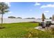 Expansive backyard featuring lush green grass and patio area, ideal for outdoor entertaining and relaxation at 1203 Pearl Tree Rd, Deltona, FL 32725