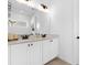 Stylish bathroom featuring dual sinks, quartz countertops, and modern fixtures at 1203 Pearl Tree Rd, Deltona, FL 32725