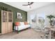 Inviting bedroom featuring ample natural light, stylish furniture, and neutral decor at 1203 Pearl Tree Rd, Deltona, FL 32725