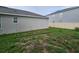 A spacious backyard perfect for outdoor entertaining or simply relaxing at 129 Eagleview Loop, Davenport, FL 33837
